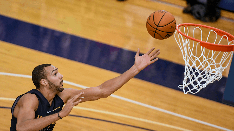 Utah Jazz player, Rudy Golbert, playing in a scrimmage at the Warrior Fitness Center